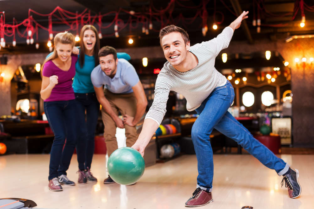 Friends bowling in Liverpool