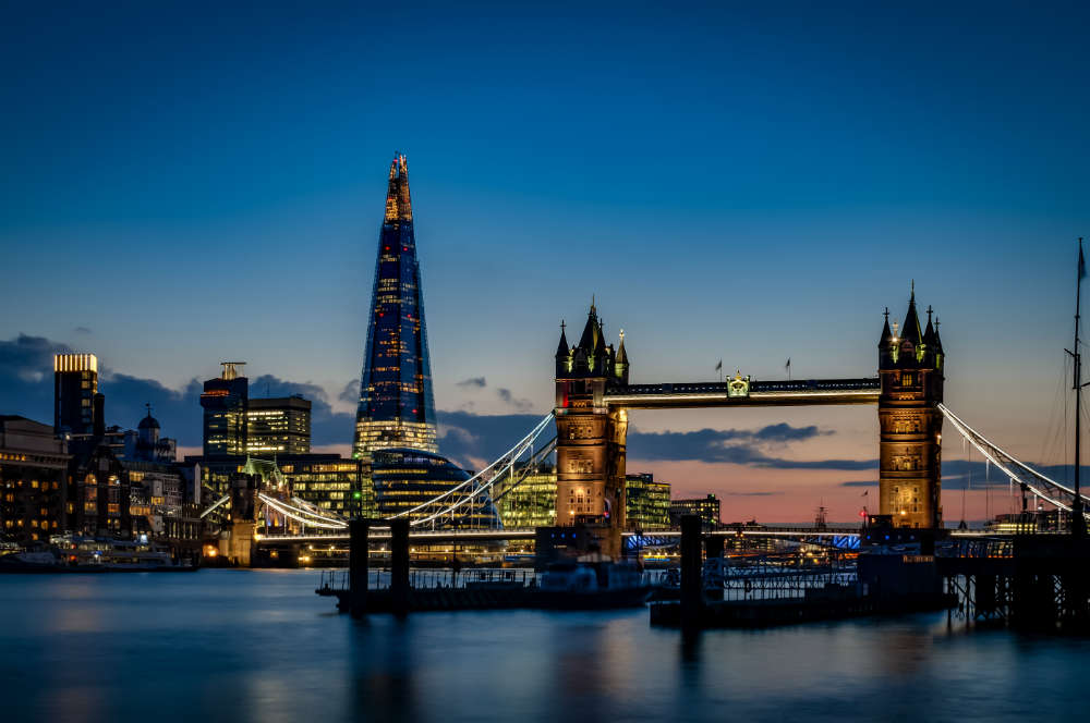 London's skyline at dusk with The Shard and Tower Bridge