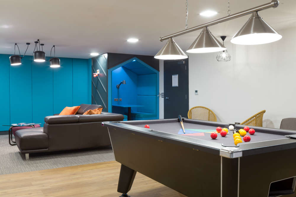The games zone with pool table at The Ascent real photo