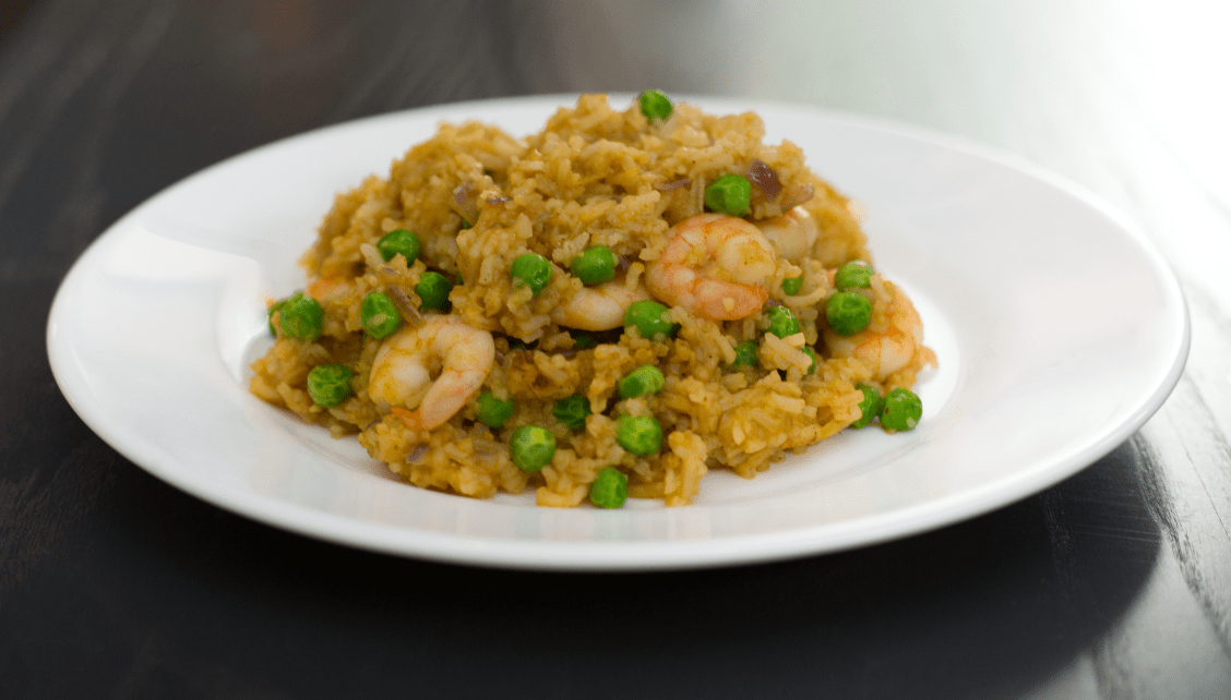 A plate of prawn stir-fried rice. Recipe created by Chris Hale for Roomzzz Aparthotels.