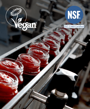 Tomato sauce on food processing line - NSF logo and Vegan Society logo 