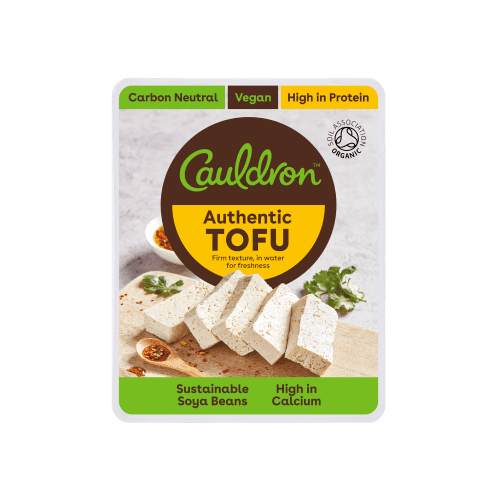 Photograph of Cauldron’s Authentic Tofu product showing that this extra firm organic tofu block is vegan, high in protein, and carbon neutral.