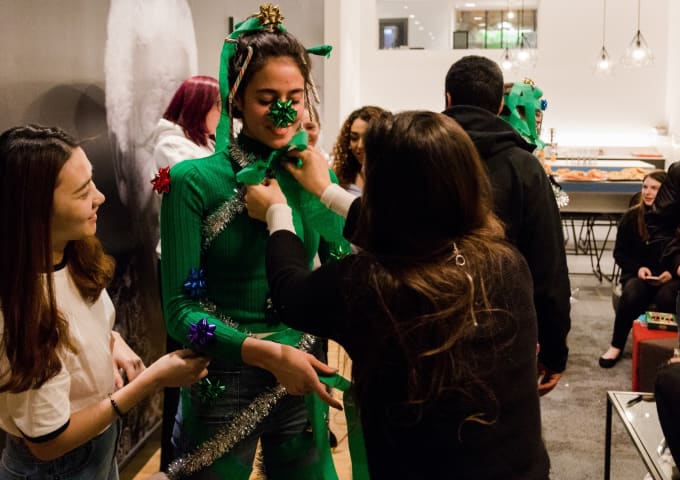 Students playing Christmas games at the IconInc Christmas party