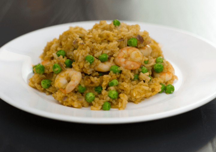 A plate of prawn stir-fried rice. Recipe created by Chris Hale for Roomzzz Aparthotels.