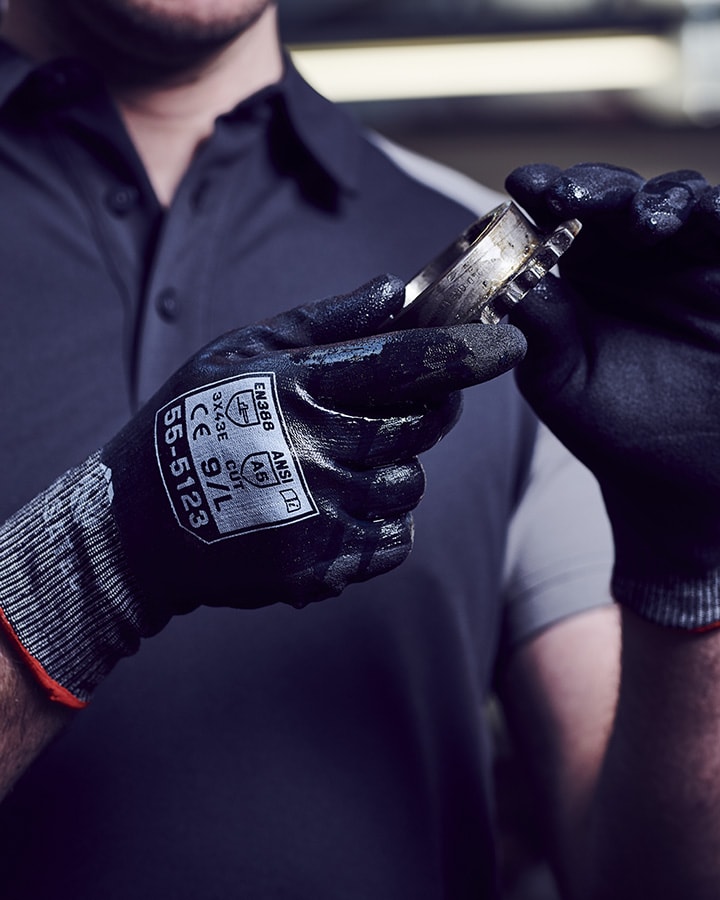 55-5123 cut resistant level E fully coated glove situ shot